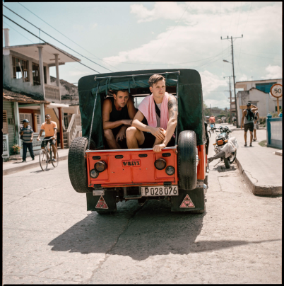 Trevor Wheatley and Cosmo Dean in back of a van