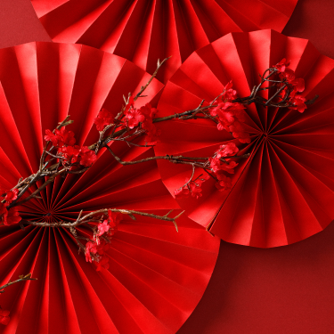 red fans and cherrywood branches