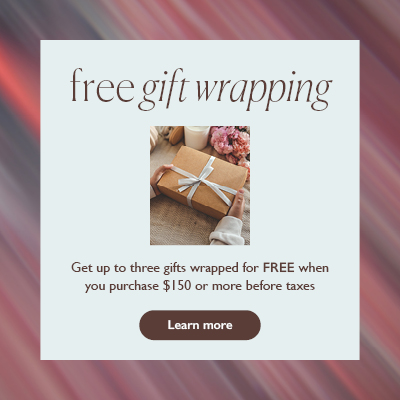 Beautifully wrapped gifts at Guest Services offering free professional gift wrapping with qualifying purchase.